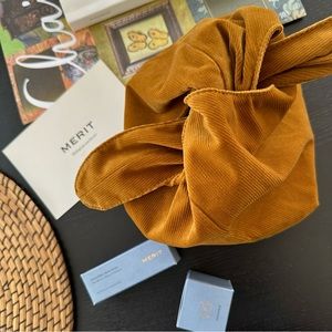 MERIT BEAUTY | Signature makeup bag in brown corduroy